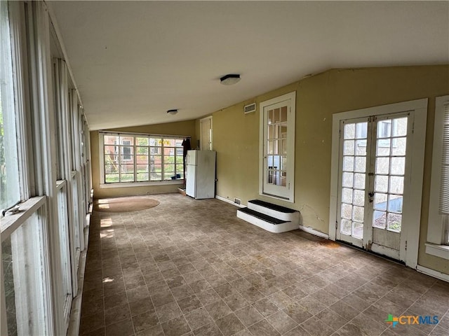 unfurnished sunroom with french doors and visible vents
