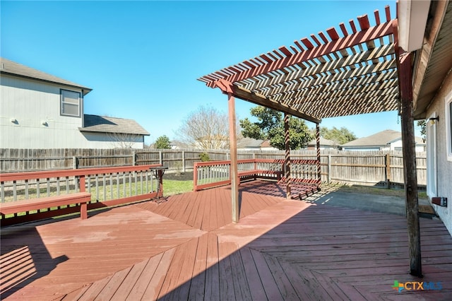 wooden deck featuring a pergola