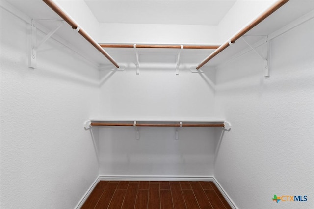 2222 Sparrow Rd, Killeen, TX 76542 - walk in closet featuring dark wood-style flooring