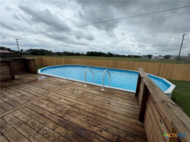 2222 Sparrow Rd, Killeen, TX 76542 - view of swimming pool with a deck and fence
