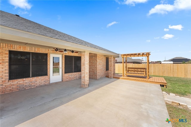 view of patio featuring a pergola and a wooden deck