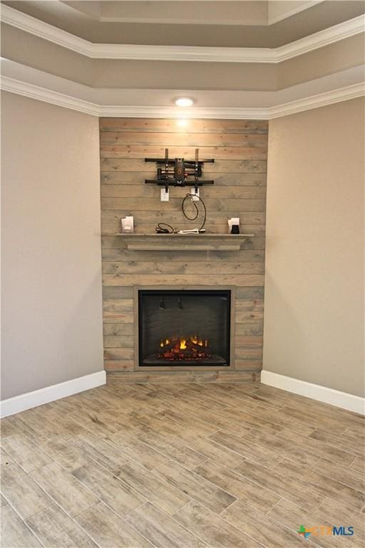 room details with hardwood / wood-style floors and a fireplace