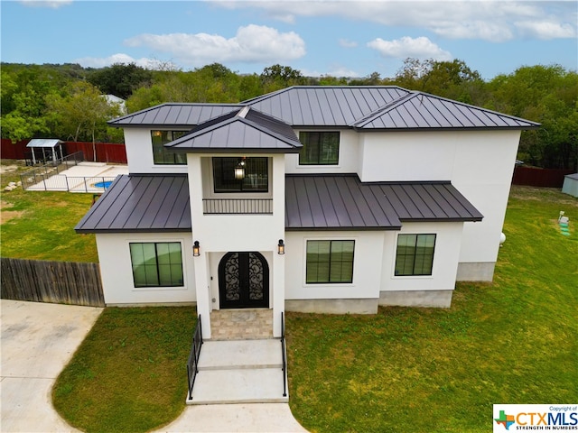 12312 White Birch St, San Antonio, TX 78245 - modern farmhouse with a standing seam roof, metal roof, and stucco siding