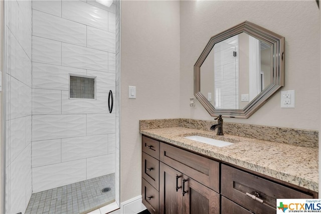 12312 White Birch St, San Antonio, TX 78245 - bathroom featuring a shower stall and vanity