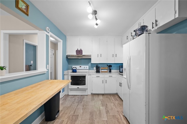 kitchen featuring white cabinetry and white appliances