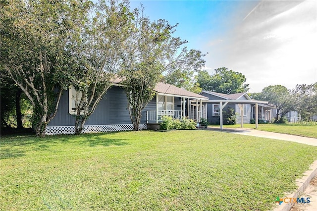 single story home with covered porch and a front lawn