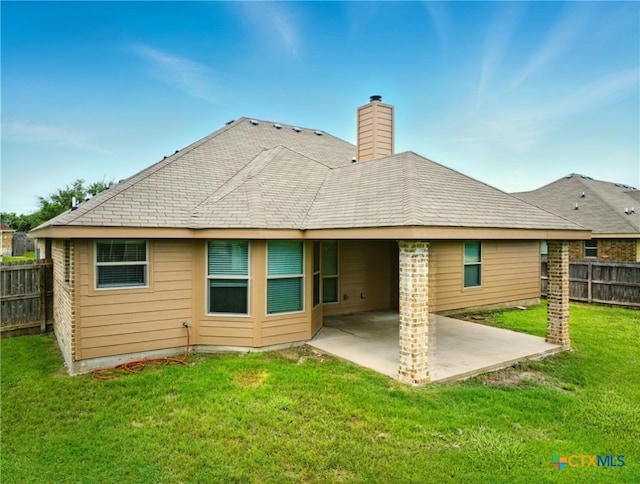 412 Coventry Dr, Temple, TX 76502 - back of house featuring a patio, a fenced backyard, and a chimney