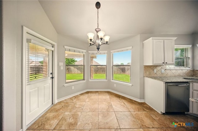 412 Coventry Dr, Temple, TX 76502 - unfurnished dining area with plenty of natural light, a chandelier, lofted ceiling, and light tile patterned floors