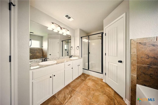 412 Coventry Dr, Temple, TX 76502 - full bath with double vanity, a stall shower, and a tub to relax in
