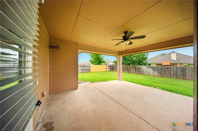 412 Coventry Dr, Temple, TX 76502 - fenced backyard with a patio and a ceiling fan