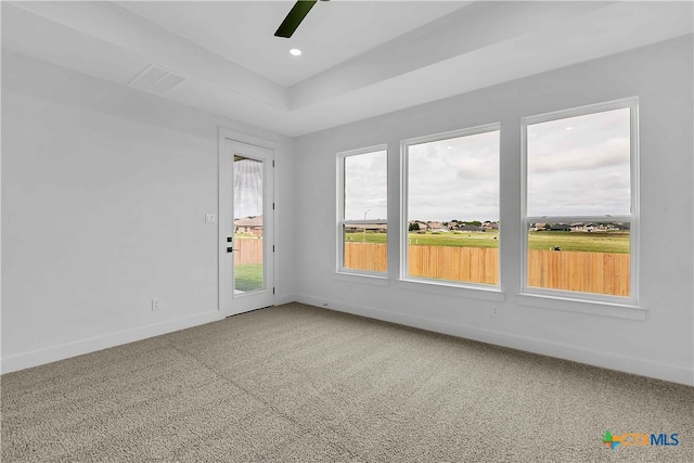 4011 Prairie Dr, Nolanville, TX 76559 - empty room featuring carpet floors, baseboards, a ceiling fan, recessed lighting, and a tray ceiling