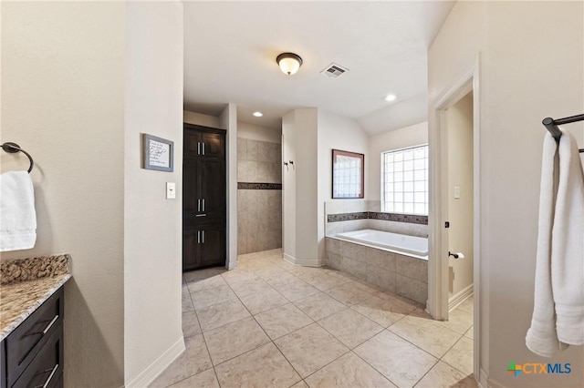 bathroom featuring visible vents, tiled shower, tile patterned floors, vanity, and a bath