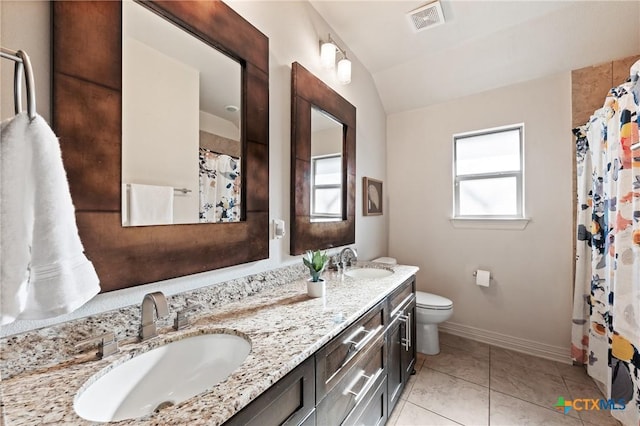 full bath featuring plenty of natural light, a sink, and visible vents