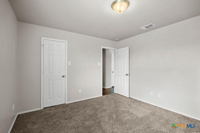 5712 Stonehaven Dr, Temple, TX 76502 - unfurnished bedroom with carpet floors and baseboards