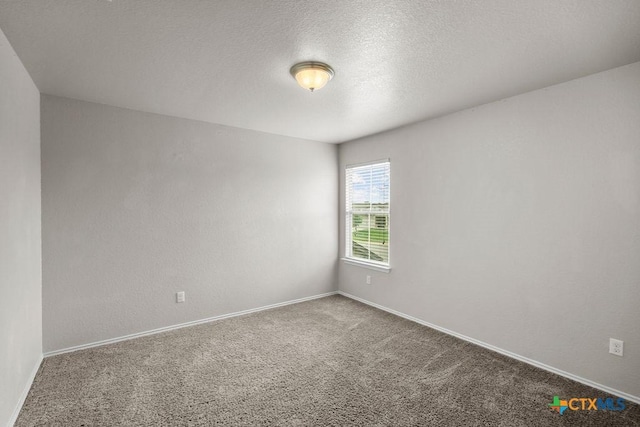 5712 Stonehaven Dr, Temple, TX 76502 - carpeted empty room featuring baseboards and a textured ceiling