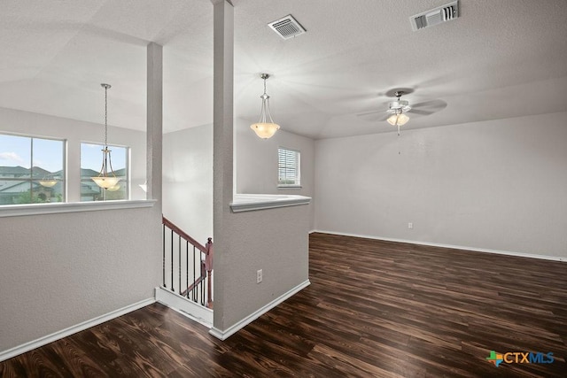 5712 Stonehaven Dr, Temple, TX 76502 - spare room featuring wood finished floors, vaulted ceiling, ceiling fan, and baseboards