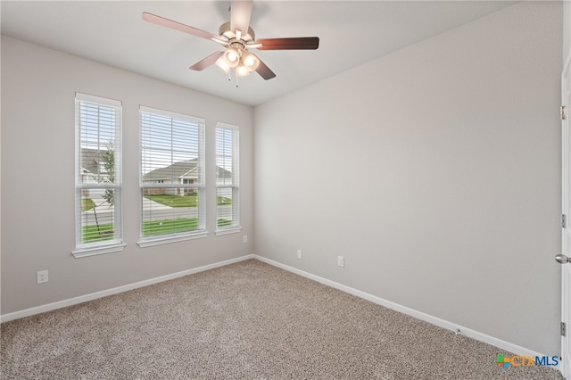 unfurnished room with carpet floors and ceiling fan