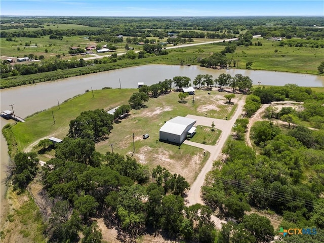 drone / aerial view with a rural view and a water view