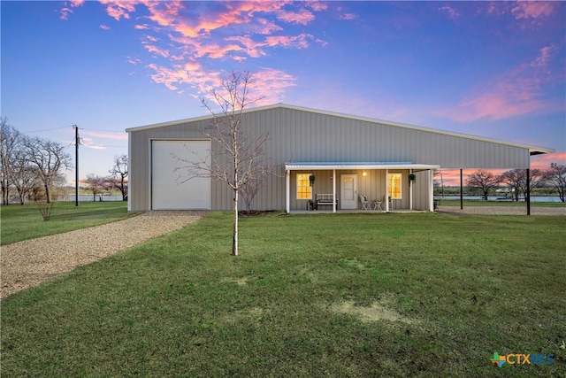 view of front of home with a front lawn and driveway