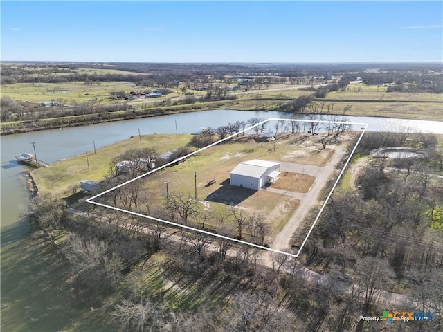 birds eye view of property featuring a water view and a rural view