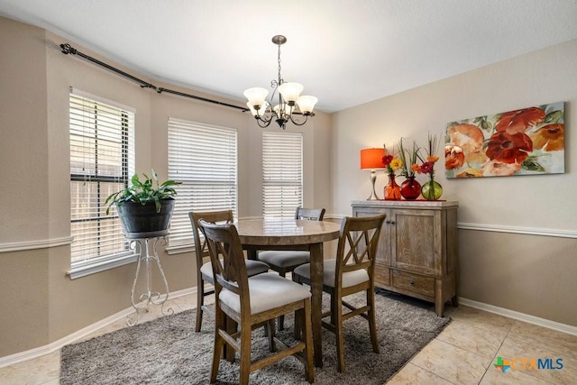 312 Beaver Loop, Temple, TX 76502 - dining space featuring a chandelier and light tile patterned flooring