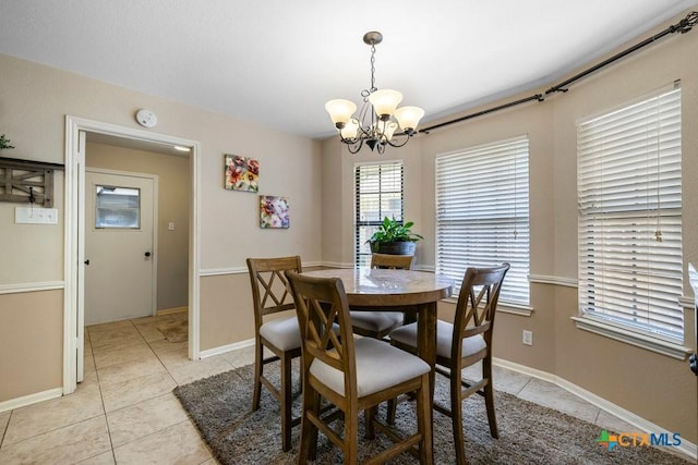 312 Beaver Loop, Temple, TX 76502 - dining area featuring a chandelier and light tile patterned flooring