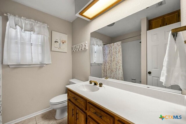 312 Beaver Loop, Temple, TX 76502 - full bath with vanity, a shower with curtain, and tile patterned floors