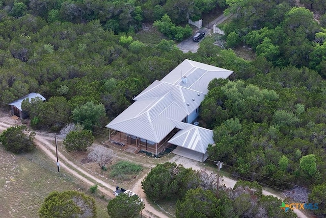 aerial view with a wooded view