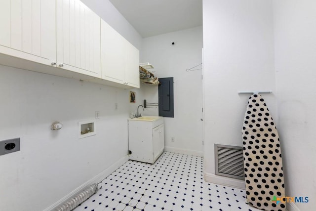 washroom featuring hookup for a washing machine, cabinet space, hookup for an electric dryer, a sink, and visible vents