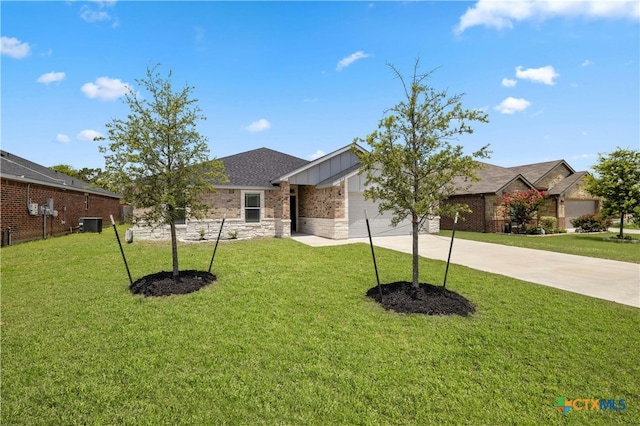 ranch-style house with central AC unit and a front yard