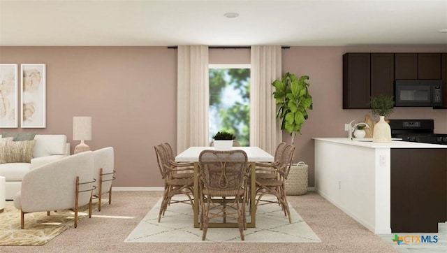 view of carpeted dining room