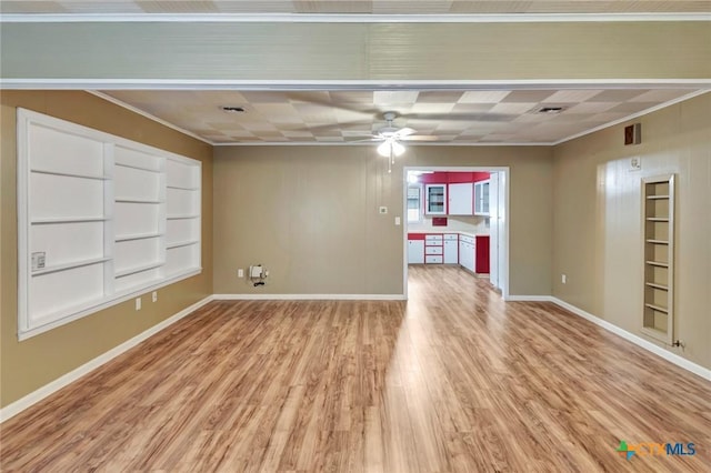 unfurnished living room featuring crown molding, light wood-style floors, ceiling fan, built in features, and baseboards