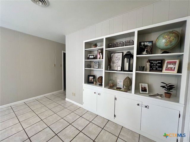 room details with built in shelves and visible vents
