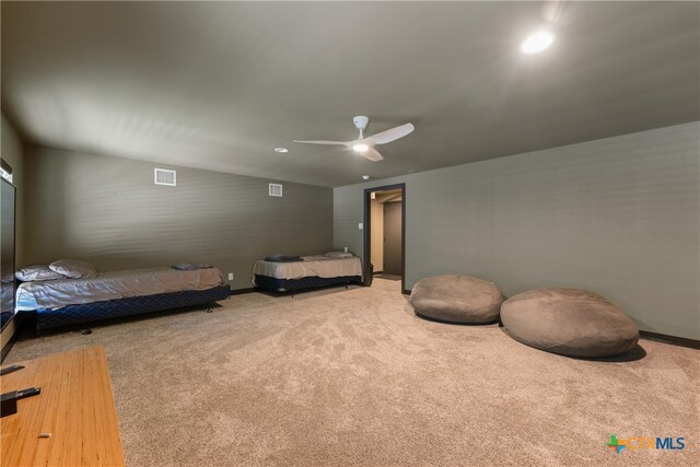 carpeted bedroom featuring ceiling fan