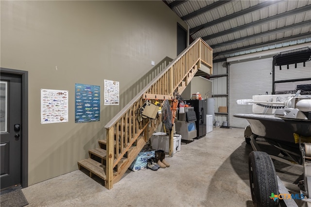 interior space featuring high vaulted ceiling and beamed ceiling