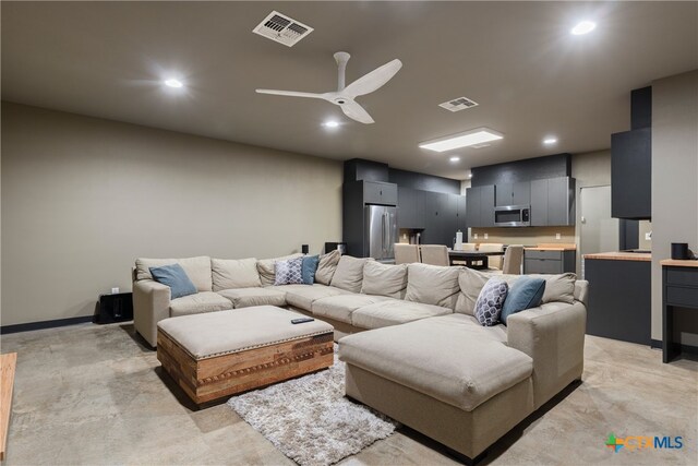 living room with ceiling fan