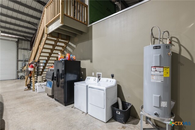 interior space featuring water heater and washer and dryer