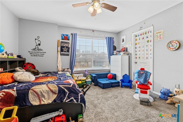 bedroom featuring carpet floors and a ceiling fan