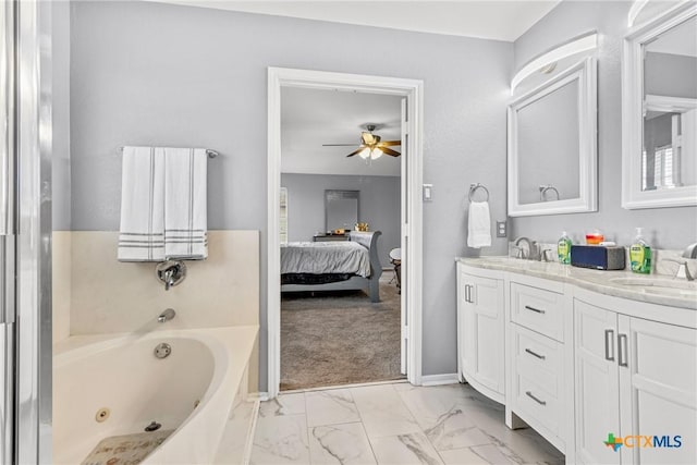 full bath with marble finish floor, double vanity, ceiling fan, ensuite bath, and a whirlpool tub