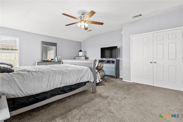 bedroom with visible vents, vaulted ceiling, carpet flooring, and ceiling fan