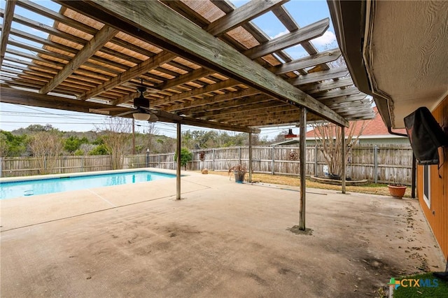 view of swimming pool with a fenced in pool, a patio area, a fenced backyard, and a pergola