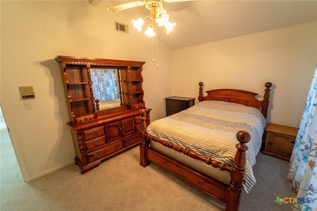 bedroom with light carpet, ceiling fan, and vaulted ceiling