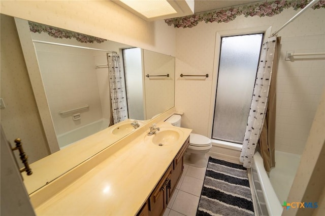 full bathroom featuring tile patterned flooring, shower / tub combo, vanity, and toilet