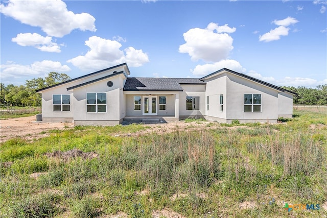 view of front of property with central AC unit