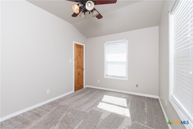 2241 Berger Rd, Temple, TX 76501 - empty room featuring lofted ceiling, carpet, a ceiling fan, and baseboards