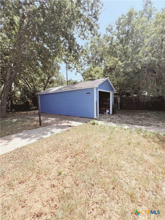 garage with a yard