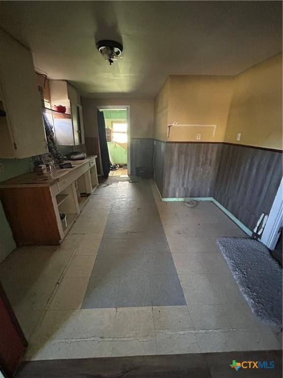 kitchen with a wainscoted wall