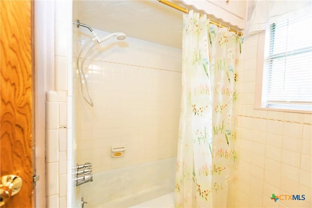 3206 Shady Hill Dr, Temple, TX 76502 - bathroom with shower / bathtub combination with curtain