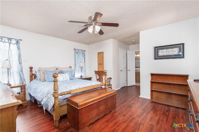 bedroom featuring a textured ceiling, wood finished floors, and a ceiling fan