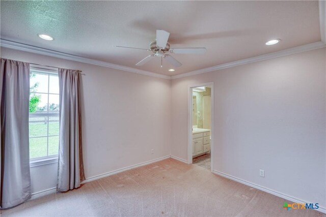1041 Clarence Rd, Temple, TX 76501 - empty room with a ceiling fan, baseboards, a wealth of natural light, and light colored carpet